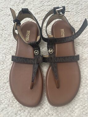 Michael Kors Brown Logo T-Strap Sandals with Gold MK Accent